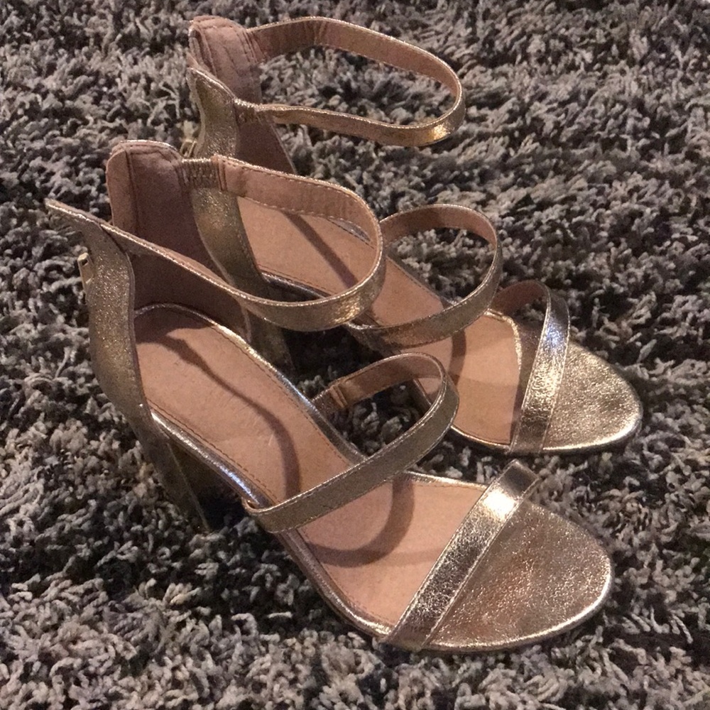Gold high heels